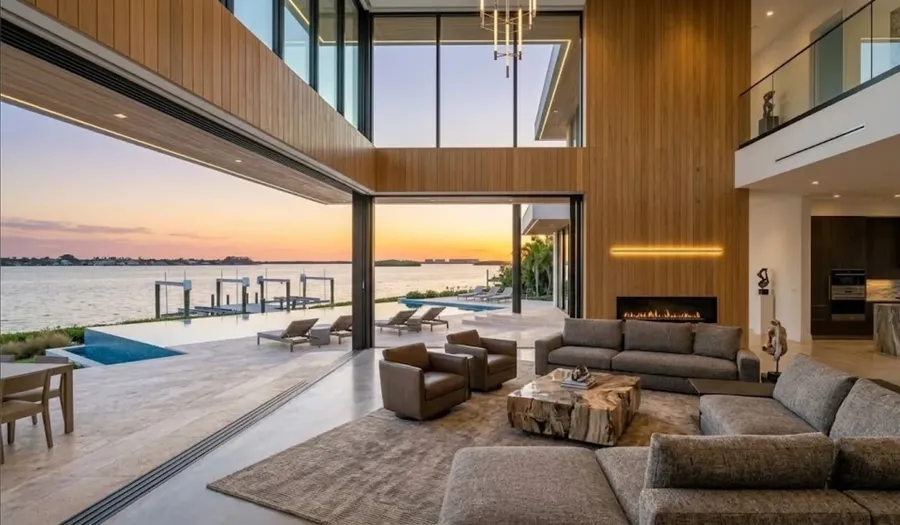 Bright open living room with water views